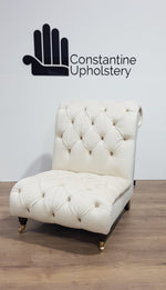 buttoned armless chair