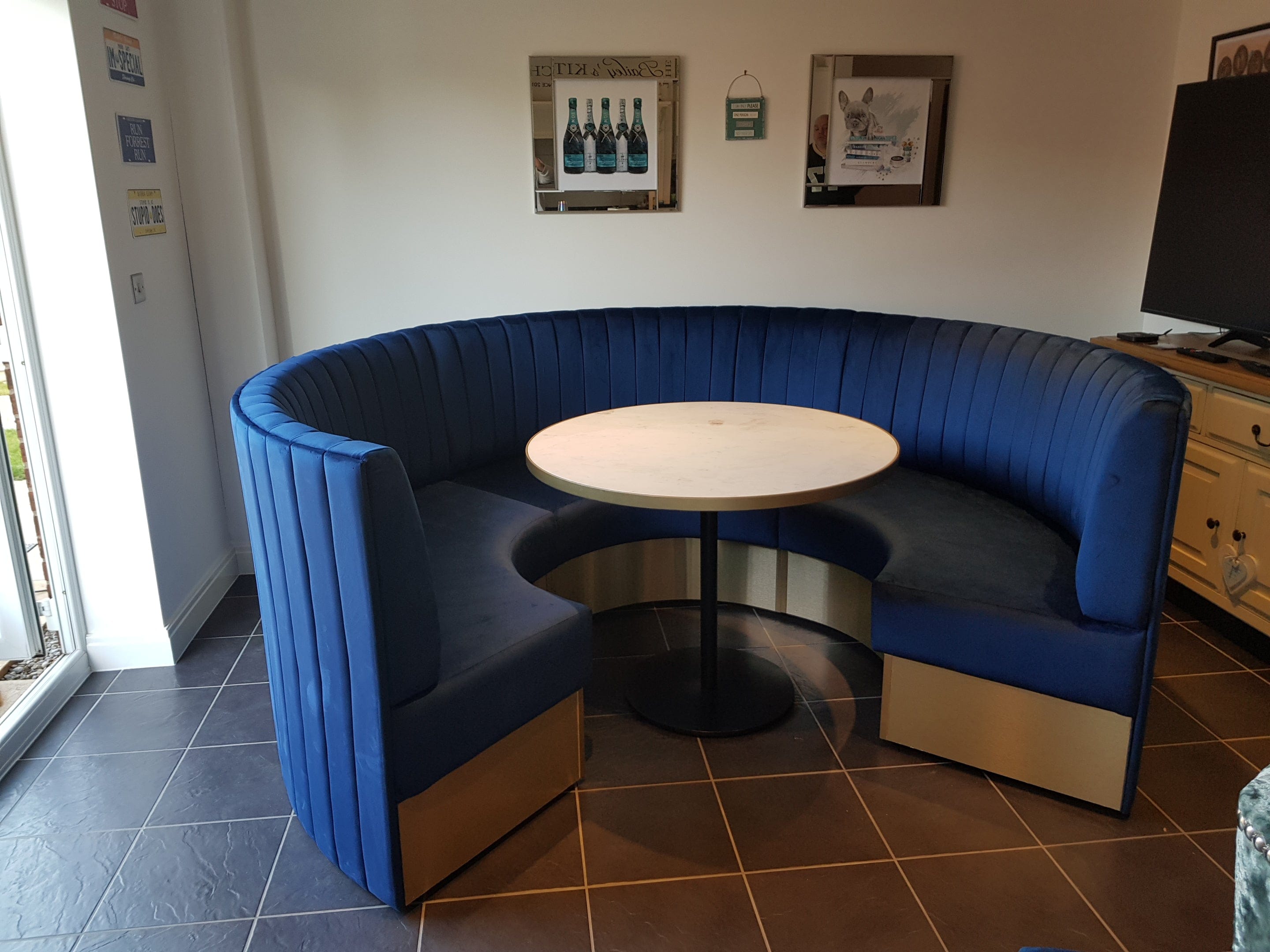 Round booth seating in blue